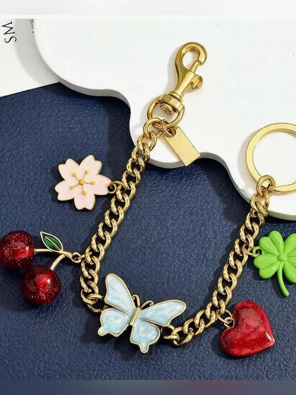Designer inspired bag charm chain.